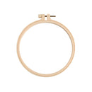 Wooden embroidery hoop on a white background