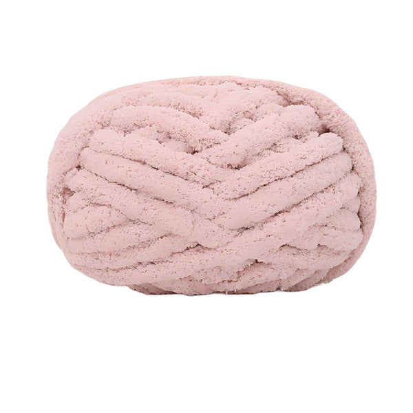 Pink knitted yarn ball on a white background