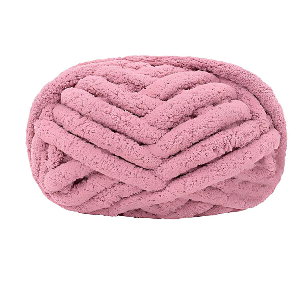 Pink braided yarn ball on a white background