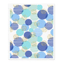 Patterned paper with blue and green circles and dots on a white background