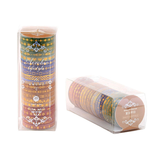 Set of washi tape rolls with decorative packaging on a white background