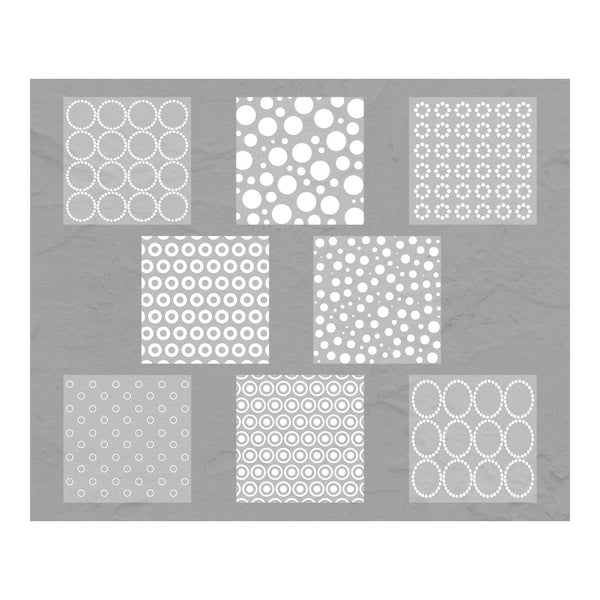 Set of eight square stencils with different circular patterns on a gray background