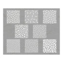 Set of eight white patterned tiles on a gray background