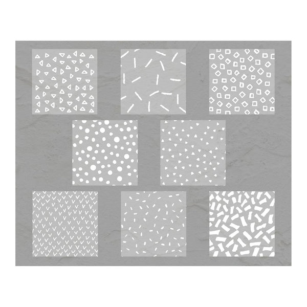 Set of eight white patterned tiles on a gray background