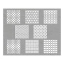 Set of nine white patterned stencils on a gray background