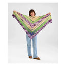 Person holding a colorful triangular scarf against a white background