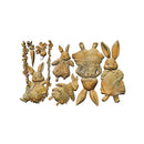 Set of wooden rabbit-shaped toys on a white background