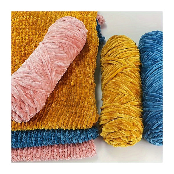 Colorful yarn skeins in pink, yellow, and blue on a white background
