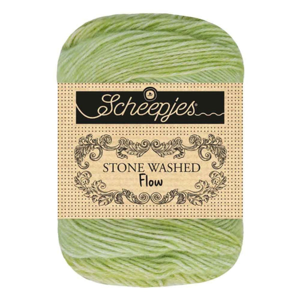 Green skein of yarn with a 'Scheepjes' label on a white background