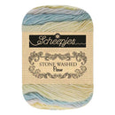 Skein of yarn with 'Scheepjes' label on a white background