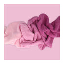 Pink knitted fabric on a pink background