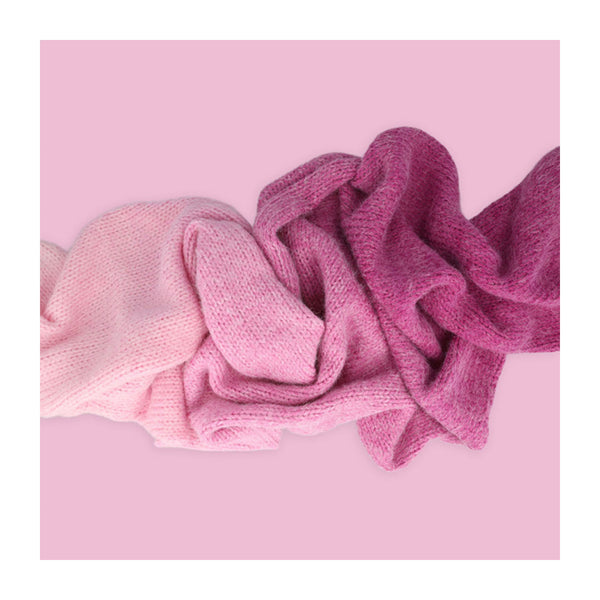Pink knitted fabric on a pink background
