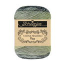 Skein of yarn with a Scheepjes label on a white background