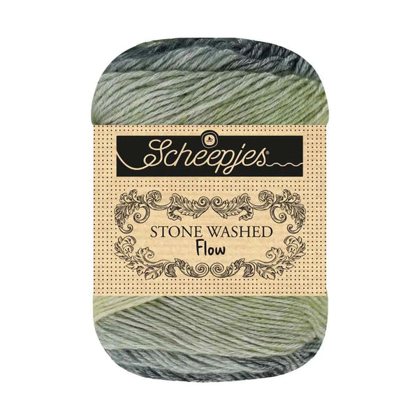 Skein of yarn with a Scheepjes label on a white background