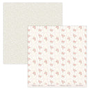 Two sheets of patterned paper, one with a subtle dot design and the other with a floral pattern, on a white background.