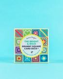 Colorful card deck packaging with a blue background
