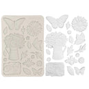 Mold with floral and butterfly designs on a white background