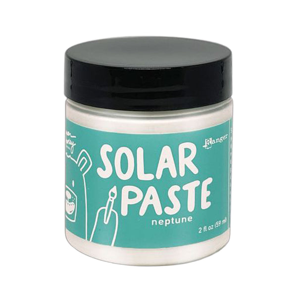 Jar of solar paste with a black lid on a white background