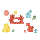 Set of colorful animal-themed stamps on a white background