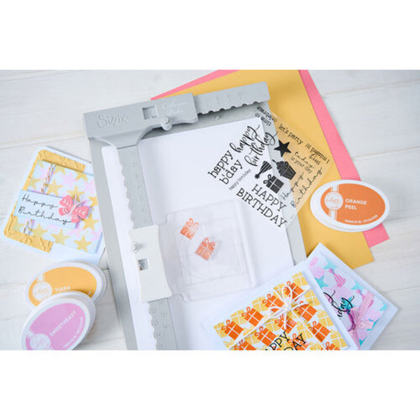 Stamp set with 'Happy Birthday' text and colorful stamps on a white background