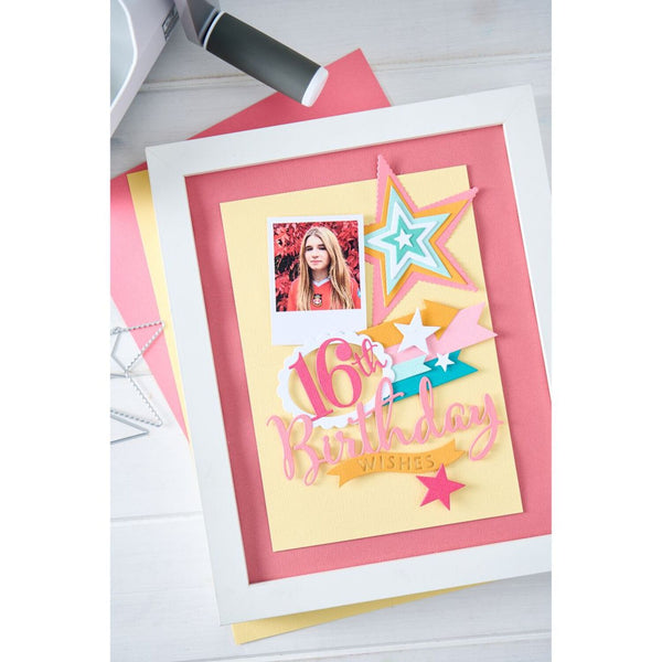 16th birthday card with colorful stars and photo on a white surface