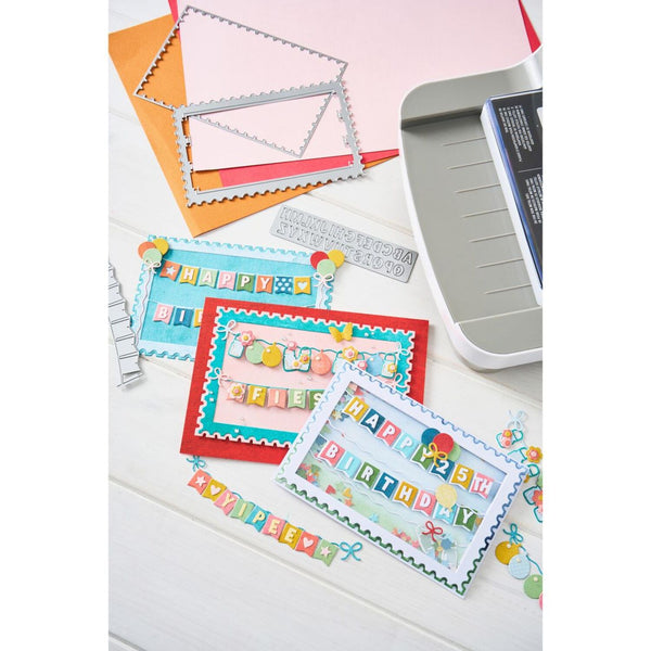 Colorful birthday cards with decorative elements on a white surface