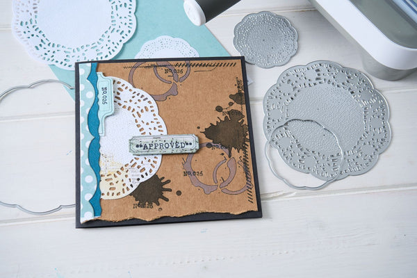 Handmade card with decorative elements on a white surface