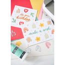 Colorful birthday-themed cards with decorative elements on a white surface.