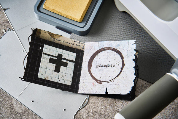 Stamps with grid, cross, and circle design on a textured surface