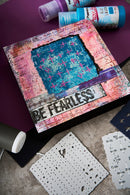 Artistic project with text 'BE FEARLESS' on a colorful background