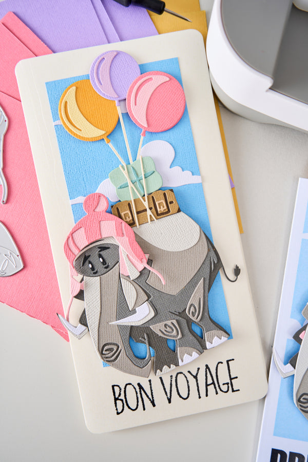 Card with an elephant holding balloons and 'Bon Voyage' text on a colorful background