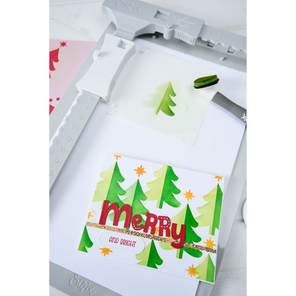 Card with 'Merry and Bright' design on a cutting machine