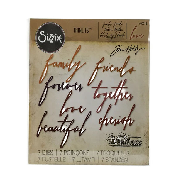 Sizzix Thinlits die set with laser-cut phrases on a beige background