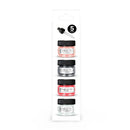 Set of four small jars with black lids and a dropper on a white background