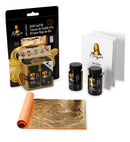 Gold leaf kit with packaging, gold leaf sheets, and bottles on a white background