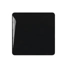 Black square tile on a white background