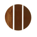 Round wooden cutting board with white stripes on a white background