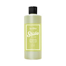 Bottle of Speedball Studio Plus paint with a black cap on a white background