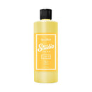 Yellow bottle of Speedball Studio Plus paint on a white background