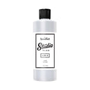 Bottle of Speedball Studio Plus glazing medium on a white background