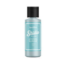 Bottle of Speedball Studio Plus ink on a white background