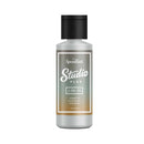 Bottle of Speedball Studio Plus paint with a black cap on a white background