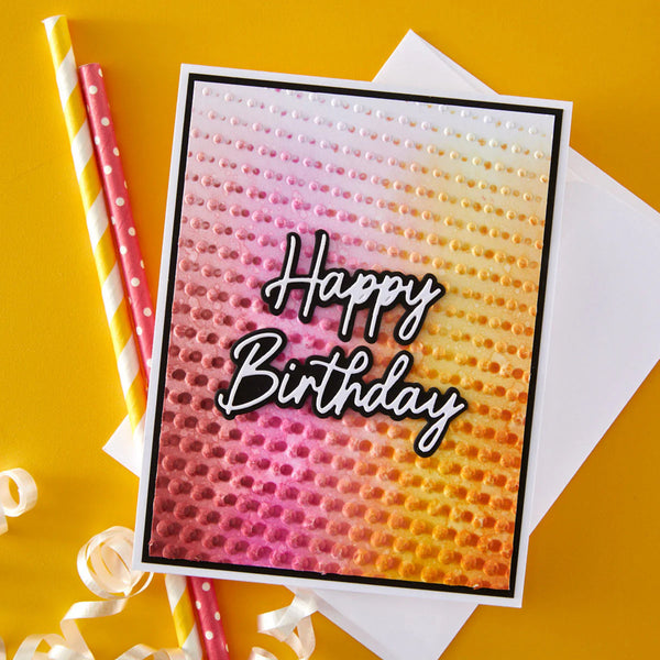 Birthday card with 'Happy Birthday' text on a textured background, with straws and ribbons on a yellow background.