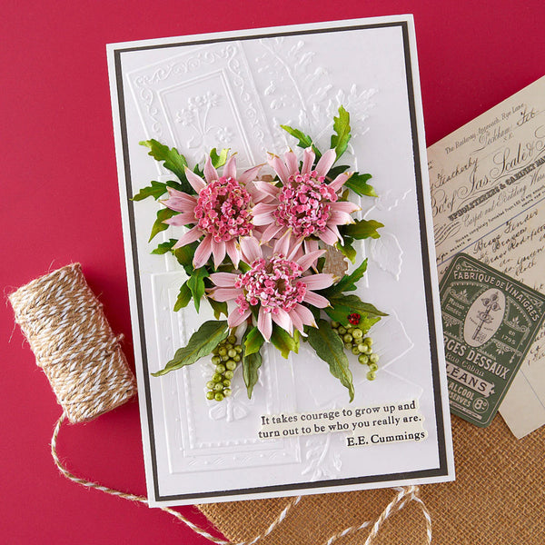 Greeting card with pink floral design and inspirational quote on a red background