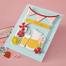 Greeting card with lemonade stand design, flowers, and 'I pick you' banner on a pink background.