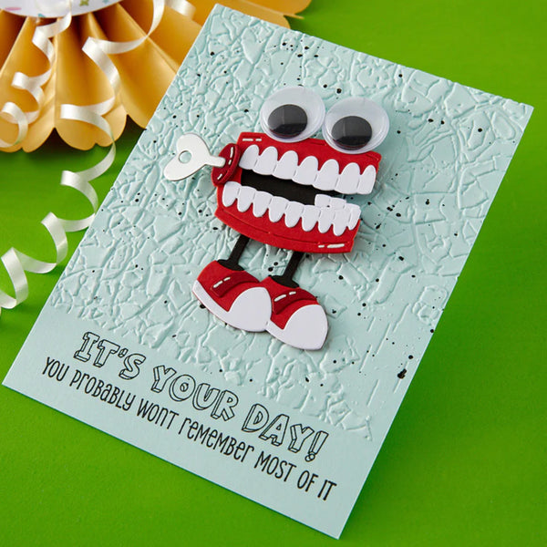 Card with a cartoonish monster design and humorous text on a green background