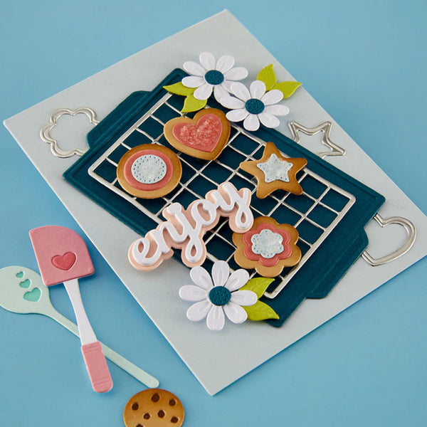 Decorative card with cookies, flowers, and utensils on a blue background