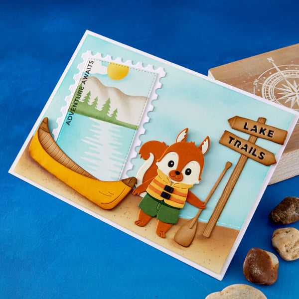 Card with a cartoon squirrel holding a paddle, surrounded by nature-themed elements on a blue background.