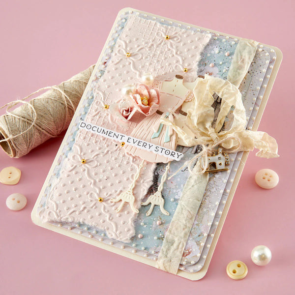 Decorative notebook with embellishments on a pink background