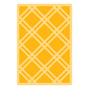 Yellow rectangular mat with a geometric pattern on a white background